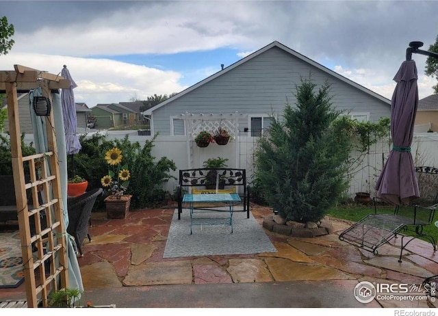 view of patio with fence