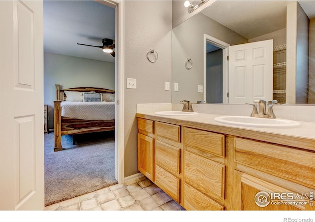 3530 Homestead Dr, Mead, CO 80542 - bathroom featuring ensuite bath, double vanity, and ceiling fan