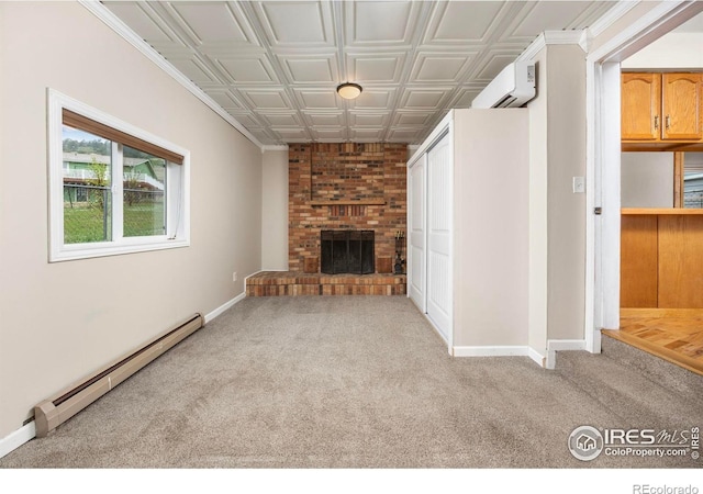 unfurnished living room with a baseboard heating unit, carpet floors, a wall mounted AC, baseboards, and an ornate ceiling