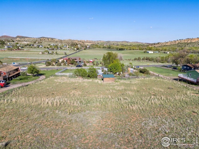 overview of rural landscape with a mountain backdrop