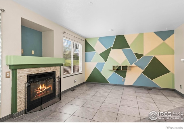 2002 E 102nd Cir, Thornton, CO 80229 - unfurnished living room featuring a fireplace and baseboards