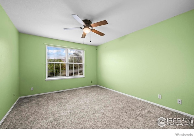 2002 E 102nd Cir, Thornton, CO 80229 - empty room featuring a ceiling fan, carpet floors, and baseboards