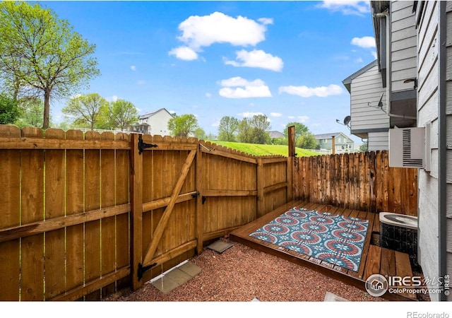 2002 E 102nd Cir, Thornton, CO 80229 - view of patio with a fenced backyard and cooling unit
