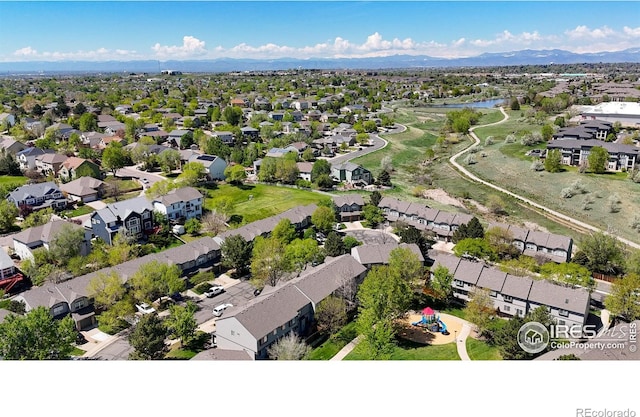 2002 E 102nd Cir, Thornton, CO 80229 - aerial perspective of suburban area featuring a water and mountain view