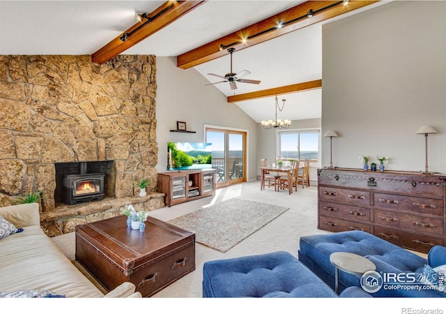 6300 Feldspar Ct, Bellvue, CO 80512 - carpeted living area featuring a chandelier, ceiling fan, beam ceiling, and high vaulted ceiling