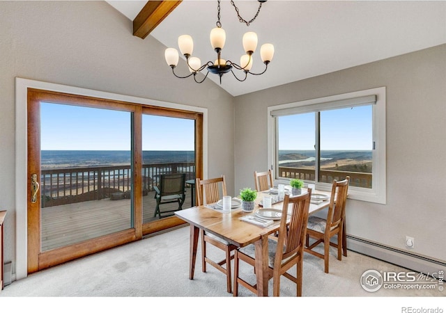6300 Feldspar Ct, Bellvue, CO 80512 - dining area featuring light carpet, baseboard heating, and a chandelier
