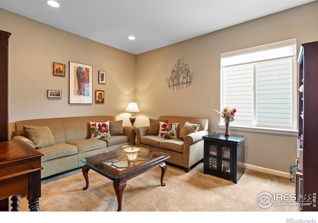 living area featuring carpet floors, recessed lighting, and baseboards