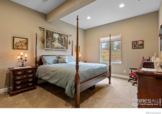 bedroom featuring light colored carpet, baseboards, and recessed lighting