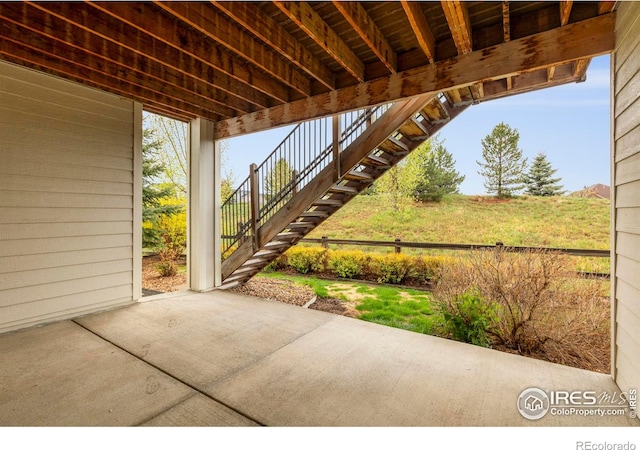 view of patio with stairway