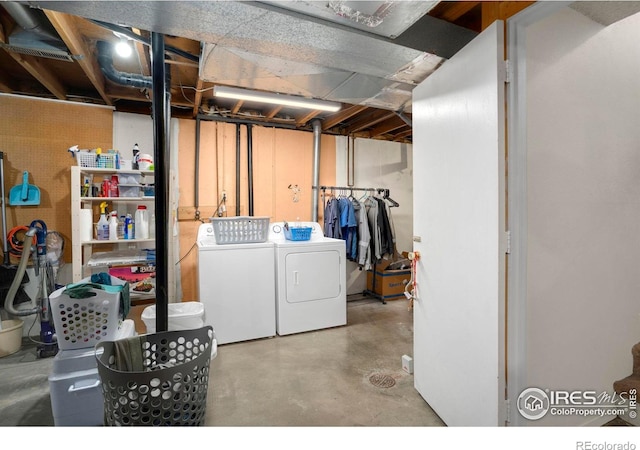 washroom with independent washer and dryer