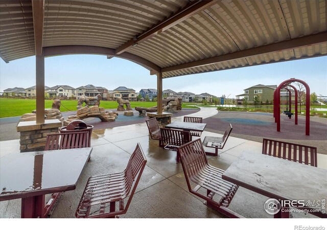view of patio with a residential view