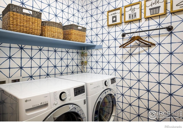 washroom with washer and clothes dryer
