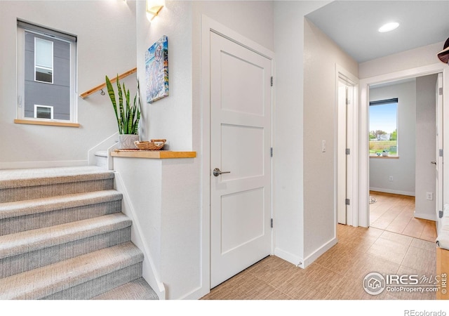 725 Amelia Ln, Lafayette, CO 80026 - staircase with baseboards and recessed lighting