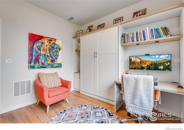 725 Amelia Ln, Lafayette, CO 80026 - office area with light wood finished floors and baseboards