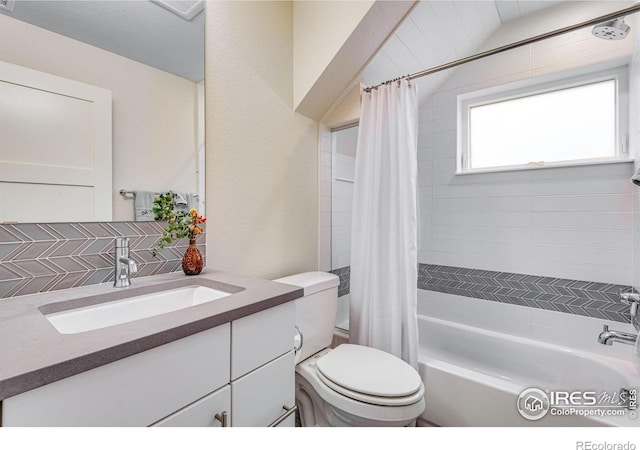 725 Amelia Ln, Lafayette, CO 80026 - bathroom with toilet, tasteful backsplash, shower / bath combination with curtain, and vanity