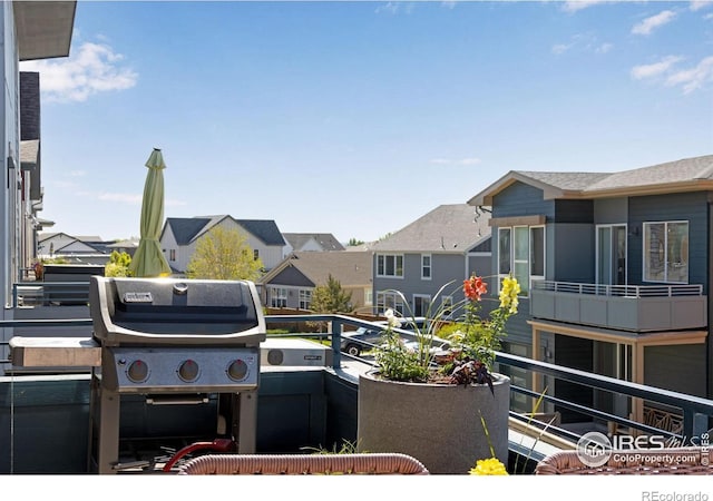 725 Amelia Ln, Lafayette, CO 80026 - view of patio with a balcony, a residential view, and area for grilling