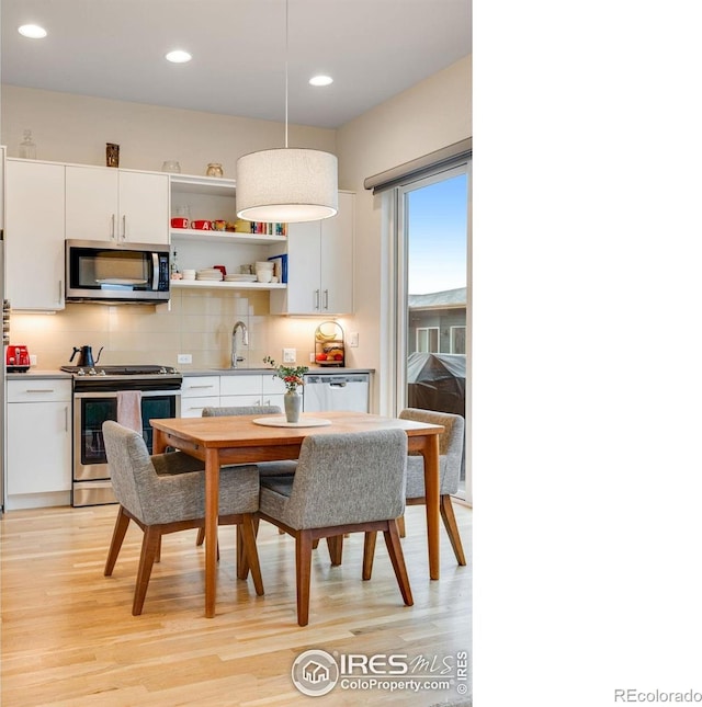 725 Amelia Ln, Lafayette, CO 80026 - dining room featuring light wood finished floors and recessed lighting