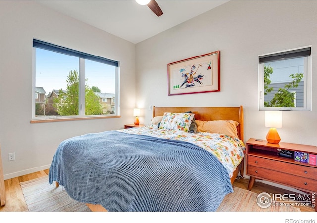 725 Amelia Ln, Lafayette, CO 80026 - bedroom with wood finished floors, baseboards, and ceiling fan