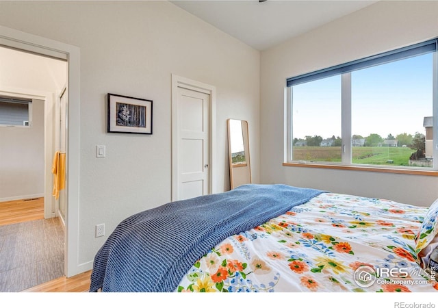 725 Amelia Ln, Lafayette, CO 80026 - bedroom featuring light wood-style floors and baseboards