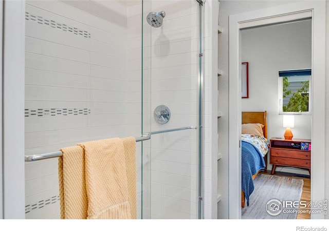 725 Amelia Ln, Lafayette, CO 80026 - ensuite bathroom featuring a shower stall and wood finished floors