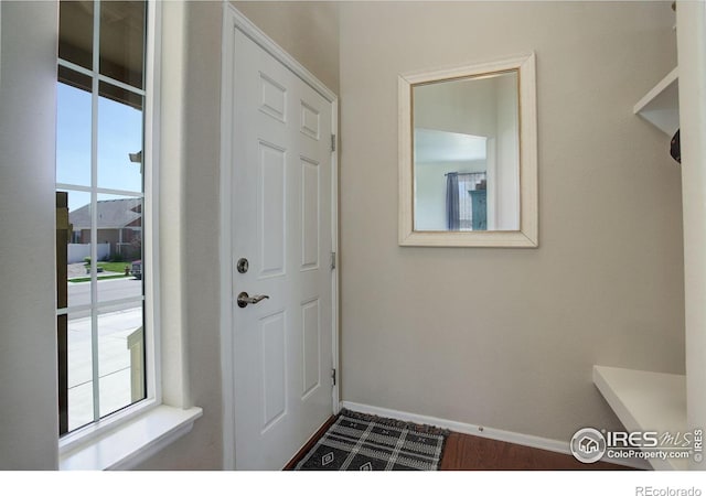 1318 Chamois Dr, Severance, CO 80550 - entryway featuring baseboards