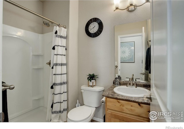 1318 Chamois Dr, Severance, CO 80550 - full bath featuring a shower with shower curtain, toilet, and vanity