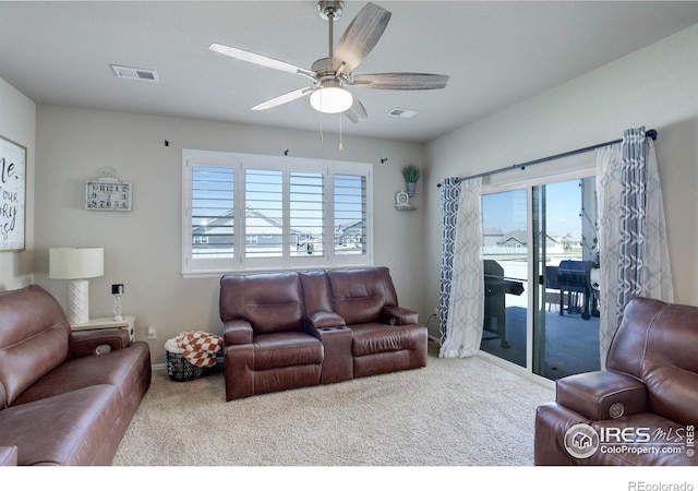 1318 Chamois Dr, Severance, CO 80550 - living area featuring carpet, ceiling fan, and baseboards