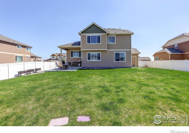 1318 Chamois Dr, Severance, CO 80550 - back of property featuring a patio area