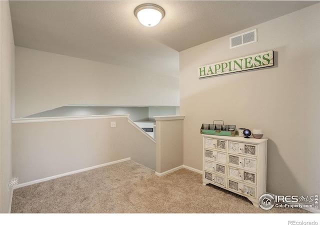 1318 Chamois Dr, Severance, CO 80550 - hallway with carpet floors, an upstairs landing, and baseboards