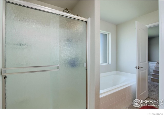 1318 Chamois Dr, Severance, CO 80550 - full bath featuring a shower stall and a garden tub