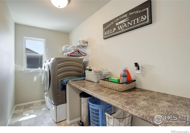 1318 Chamois Dr, Severance, CO 80550 - laundry area featuring independent washer and dryer and baseboards