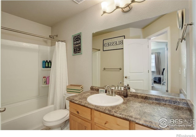 1318 Chamois Dr, Severance, CO 80550 - bathroom featuring vanity, toilet, and shower / bath combo with shower curtain