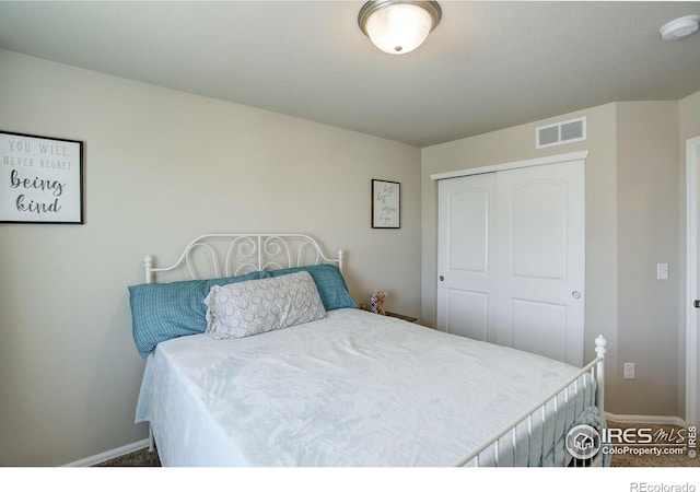 1318 Chamois Dr, Severance, CO 80550 - carpeted bedroom featuring baseboards and a closet