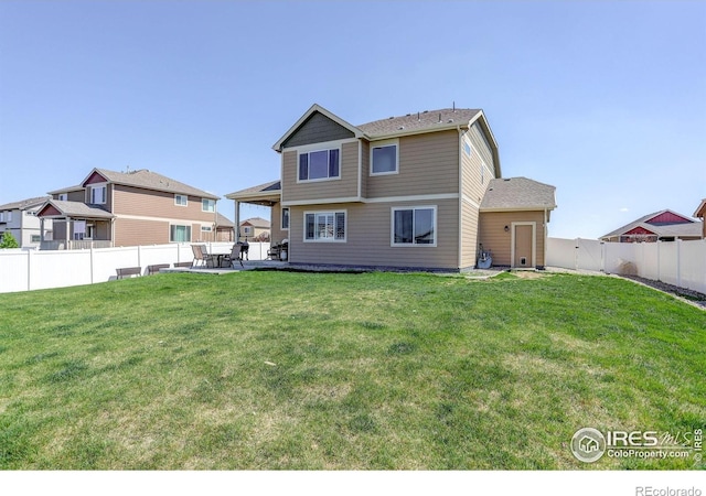 1318 Chamois Dr, Severance, CO 80550 - rear view of property featuring a patio