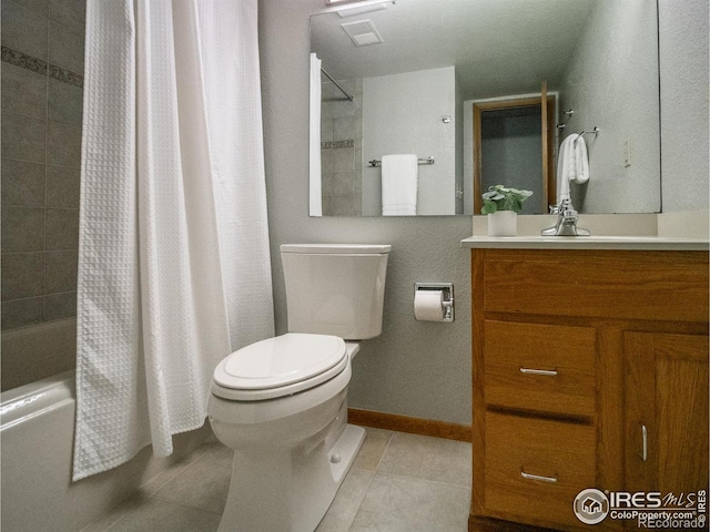 full bath with tile patterned flooring, baseboards, toilet, shower / bath combo, and vanity