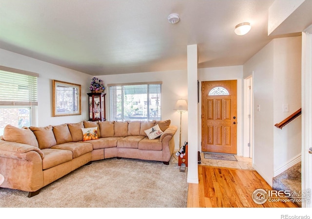 11656 Logan St, Northglenn, CO 80233 - living room with light wood-style flooring and baseboards