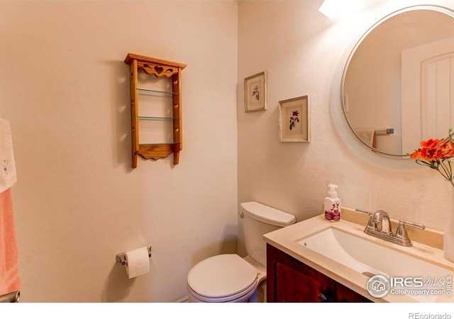 11656 Logan St, Northglenn, CO 80233 - bathroom featuring toilet and vanity
