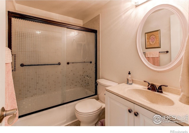 11656 Logan St, Northglenn, CO 80233 - bathroom with toilet, combined bath / shower with glass door, and vanity