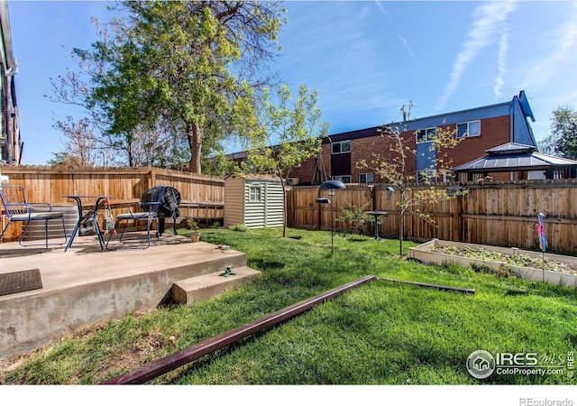 11656 Logan St, Northglenn, CO 80233 - view of yard with a garden, a patio area, a storage unit, an outbuilding, and a gazebo
