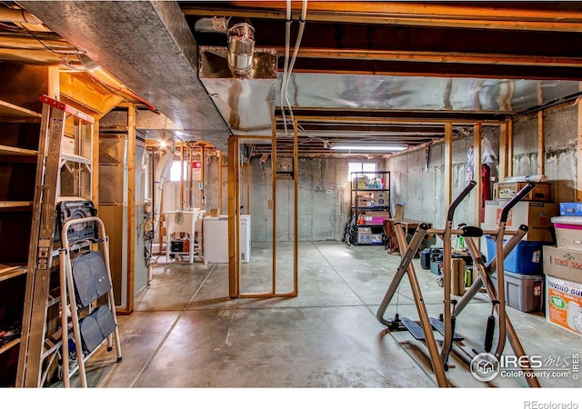 11656 Logan St, Northglenn, CO 80233 - below grade area featuring independent washer and dryer