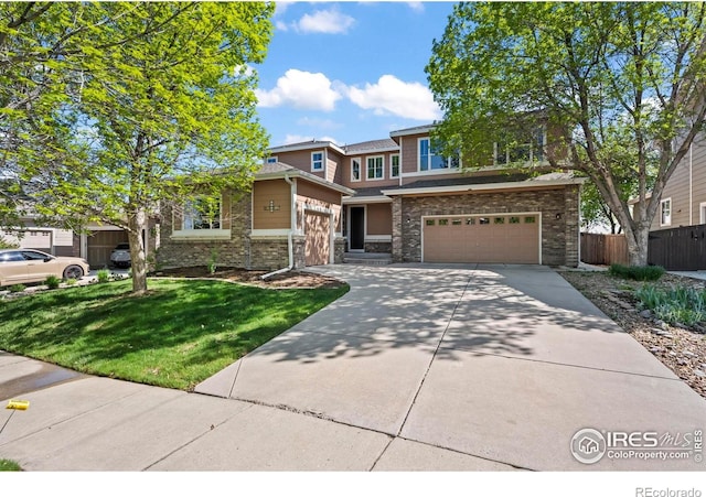 2458 Vale Way, Erie, CO 80516 - view of front facade featuring driveway and a garage