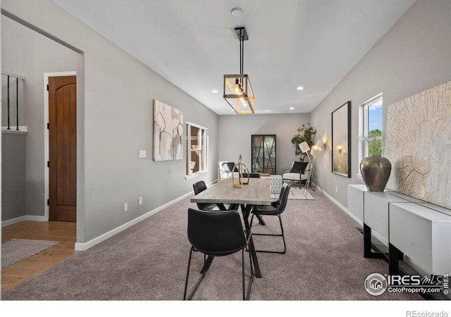 2458 Vale Way, Erie, CO 80516 - carpeted dining room featuring baseboards, recessed lighting, and wood finished floors