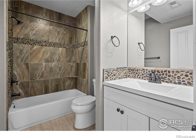 2458 Vale Way, Erie, CO 80516 - full bath with toilet, wood finished floors, shower / washtub combination, and vanity