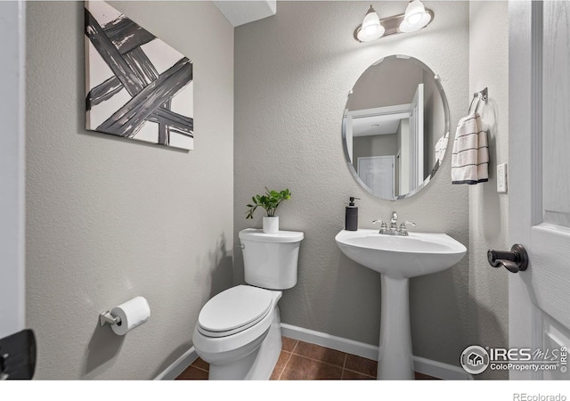 2458 Vale Way, Erie, CO 80516 - half bath with tile patterned flooring and toilet