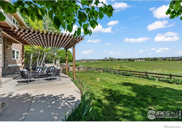 2458 Vale Way, Erie, CO 80516 - view of yard featuring a pergola, a patio area, a view of countryside, and outdoor lounge area