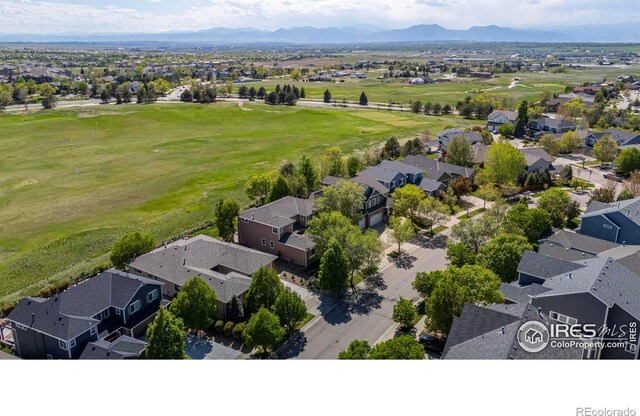 2458 Vale Way, Erie, CO 80516 - aerial view of residential area featuring a mountain backdrop