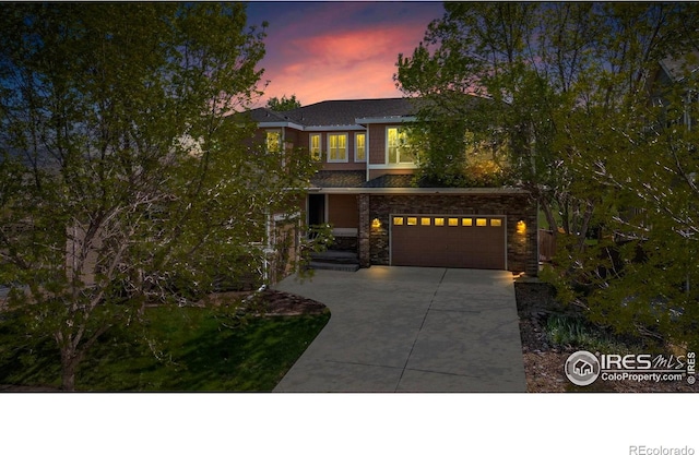 2458 Vale Way, Erie, CO 80516 - view of front facade featuring concrete driveway and an attached garage