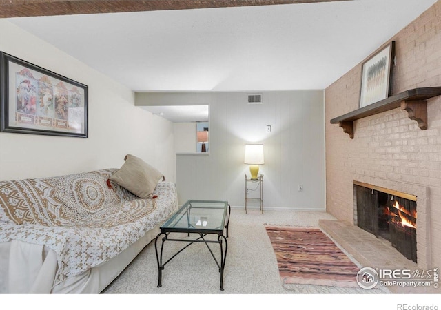 living room featuring a fireplace, carpet, and baseboards