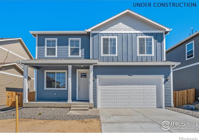 view of front of property featuring covered porch, board and batten siding, fence, an attached garage, and concrete driveway