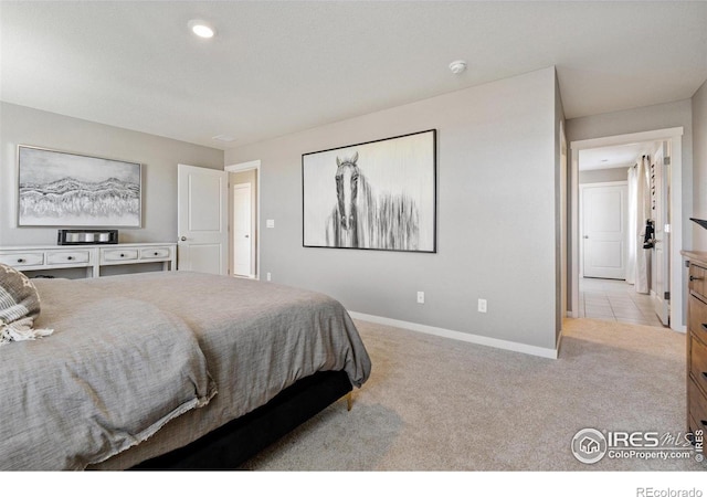 bedroom featuring carpet flooring, baseboards, and recessed lighting